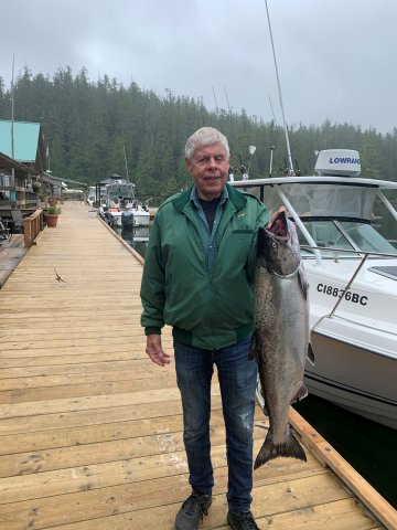 oh fished with Slivers Charters Salmon Sport Fishing and landed this beautiful Chinook salmon on a white hootchie